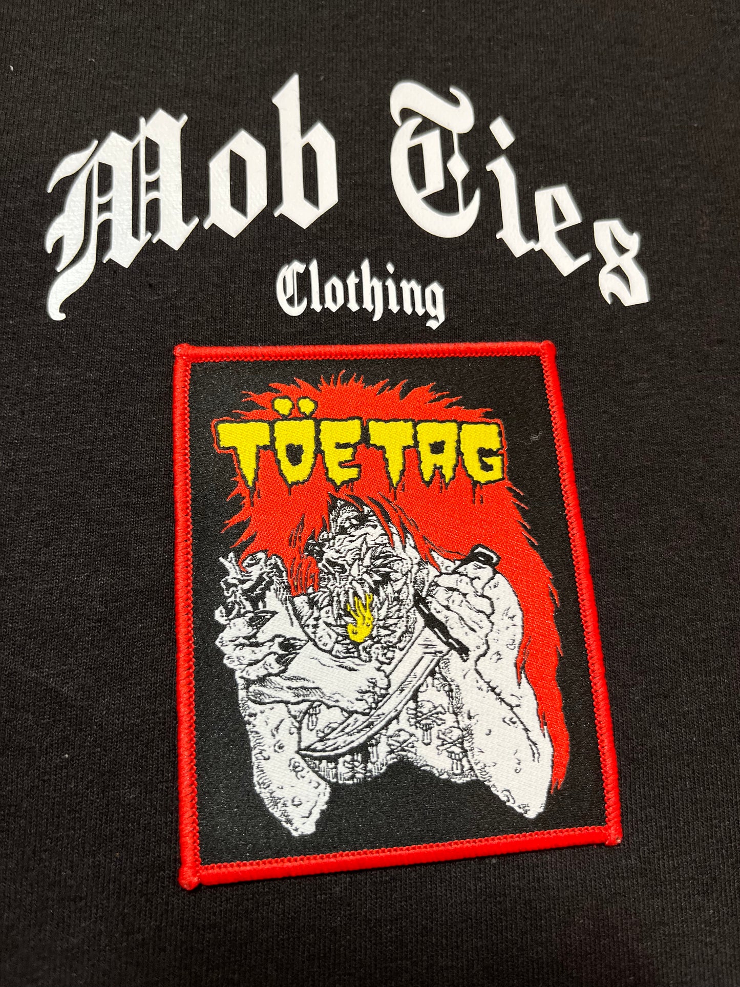 “TOE TAG” PATCH TEE (S)